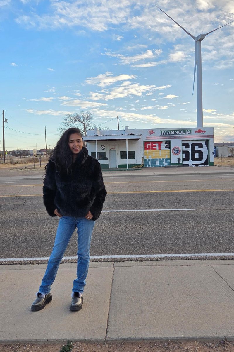 Woman at Route 66 sign